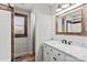 Bathroom showcasing a shower/tub combo with a vanity at 201 Indian Hill Rd, Union Grove, NC 28689