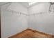 A walk-in closet with shelving and wood floor at 201 Indian Hill Rd, Union Grove, NC 28689