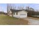 Single Gathering home with an attached garage, siding and brick accents at 201 Indian Hill Rd, Union Grove, NC 28689