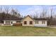 Charming ranch-style home with light siding, complemented by a well-manicured lawn and decorative shutters at 201 Indian Hill Rd, Union Grove, NC 28689