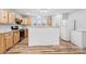 Well-lit kitchen with a large island, modern appliances, and ample cabinet space at 201 Indian Hill Rd, Union Grove, NC 28689