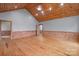 Spacious room featuring hardwood floors, wood trim, neutral colored walls, and recessed lighting at 201 Indian Hill Rd, Union Grove, NC 28689
