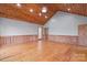 Spacious room featuring hardwood floors, wood trim, neutral colored walls, and recessed lighting at 201 Indian Hill Rd, Union Grove, NC 28689