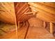 Unfinished attic space with exposed wooden beams at 202 Oakwood St, Stanfield, NC 28163