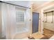 Bathroom featuring a shower, bathtub, and walk-in closet at 202 Oakwood St, Stanfield, NC 28163