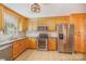 Kitchen features stainless steel appliances, and a breakfast bar at 202 Oakwood St, Stanfield, NC 28163