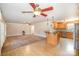 Open-concept layout with kitchen and living room area at 202 Oakwood St, Stanfield, NC 28163