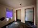 This bedroom features an AC unit, a window and closet space, ready for your personal touches and updates at 2124 W C St, Kannapolis, NC 28081