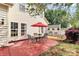 Enjoy outdoor dining on this home's patio and wood deck, perfect for gatherings at 2217 Heath Lake Dr, Mint Hill, NC 28227