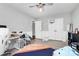 Bedroom with laminate flooring, a ceiling fan, and a large sunny window at 2217 Heath Lake Dr, Mint Hill, NC 28227