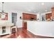 Open kitchen area with a breakfast nook featuring wood floors at 2217 Heath Lake Dr, Mint Hill, NC 28227