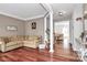 Inviting living room featuring hardwood floors and a comfortable neutral-toned sofa at 2217 Heath Lake Dr, Mint Hill, NC 28227