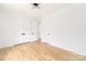 Spacious bedroom showcases hardwood floors, closet space, and neutral walls with modern lighting at 2965 Beech Nut Rd, Charlotte, NC 28208