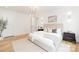 Beautiful bedroom with hardwood floors, and tasteful decor with ample natural light and neutral tones at 2965 Beech Nut Rd, Charlotte, NC 28208