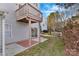 Backyard featuring a wooden deck overhead, complemented by a brick paver patio at 3099 Windsor Trace Dr, Fort Mill, SC 29707