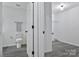 Bathroom featuring a toilet and a closet space for storage and bright neutral paint at 3099 Windsor Trace Dr, Fort Mill, SC 29707