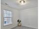 Carpeted bedroom with window allowing natural light at 3099 Windsor Trace Dr, Fort Mill, SC 29707