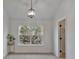 Bedroom with a closet and a large window showcasing the outside landscape at 3099 Windsor Trace Dr, Fort Mill, SC 29707