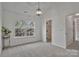 Bright bedroom with a closet and a large window showcasing the outside landscape at 3099 Windsor Trace Dr, Fort Mill, SC 29707