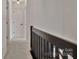 Upstairs hallway with modern railing and access to bedrooms and bathrooms at 3099 Windsor Trace Dr, Fort Mill, SC 29707