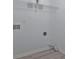 A laundry area with connections and a wire rack shelf for added storage in the home at 3099 Windsor Trace Dr, Fort Mill, SC 29707
