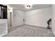Expansive carpeted living room featuring ample space and bright lighting at 3099 Windsor Trace Dr, Fort Mill, SC 29707