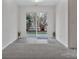 Living space featuring bright light with a sliding glass door leading to the outdoor patio and backyard at 3099 Windsor Trace Dr, Fort Mill, SC 29707