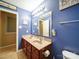 Bathroom offering a double sink vanity with decorative accents and ample lighting at 3841 Shasta Cir, Clover, SC 29710