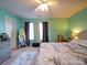 Bright bedroom with a ceiling fan, ample natural light, and stylish decor at 3841 Shasta Cir, Clover, SC 29710