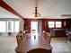Dining room features long table and chairs, view of the kitchen and living room at 3841 Shasta Cir, Clover, SC 29710