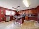 Spacious kitchen features wood cabinets, stainless appliances and a large eat at island at 3841 Shasta Cir, Clover, SC 29710