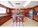 Open concept kitchen featuring stainless steel appliances, granite countertops, and wood cabinets at 3841 Shasta Cir, Clover, SC 29710