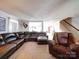 Expansive living room featuring plush seating and seamless transition to staircase, ideal for relaxation at 3841 Shasta Cir, Clover, SC 29710