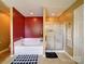 The main bathroom includes a soaking tub with shower and a glass door shower unit at 3841 Shasta Cir, Clover, SC 29710