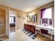 This main bathroom is connected to the main bedroom and has double sinks and a vanity area at 3841 Shasta Cir, Clover, SC 29710