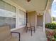 Inviting porch with comfortable chairs offers a relaxing outdoor space, enhancing curb appeal at 3841 Shasta Cir, Clover, SC 29710