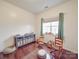 Bright bedroom features hardwood floors, natural light, and ample storage space at 4032 River Falls Dr, Lowell, NC 28098