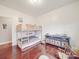 Bedroom with bunk bed, storage and hardwood floors at 4032 River Falls Dr, Lowell, NC 28098