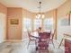 Bright dining area offers natural light and a view, complemented by a wood table set at 4032 River Falls Dr, Lowell, NC 28098