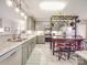Updated kitchen features granite countertops, stainless steel appliances, and ample storage space at 4032 River Falls Dr, Lowell, NC 28098