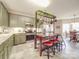 This kitchen features custom cabinets, stainless appliances and center island with seating at 4032 River Falls Dr, Lowell, NC 28098