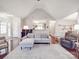 Comfortable living room with an open floorplan and hardwood floors throughout at 4032 River Falls Dr, Lowell, NC 28098
