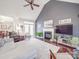 Bright living room with a vaulted ceiling and an open floorplan to the dining room at 4032 River Falls Dr, Lowell, NC 28098
