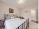 Cozy main bedroom with decorative bedding and a relaxing atmosphere at 4032 River Falls Dr, Lowell, NC 28098