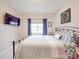 Spacious main bedroom featuring a large window and cozy decor at 4032 River Falls Dr, Lowell, NC 28098