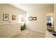 Cozy bedroom featuring a wall bed with cabinets and decorative wall art at 4321 Duplin Dr, Charlotte, NC 28214
