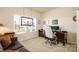 Comfortable office space featuring plush carpet, bright window, desk and chair at 4321 Duplin Dr, Charlotte, NC 28214