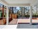 Back deck featuring overhead beams, a stained wood deck, and an outdoor shed at 4329 Hunton Dale Nw Rd, Concord, NC 28027