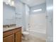 Bathroom with a vanity, granite countertop, and a tub with shower at 4329 Hunton Dale Nw Rd, Concord, NC 28027