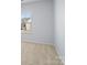 Corner bedroom with a window providing natural light, carpet flooring at 4329 Hunton Dale Nw Rd, Concord, NC 28027